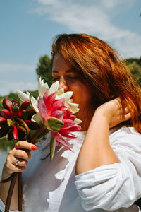 Portrait of woman with bouquet