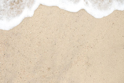 High angle view of sand on beach