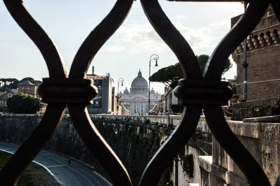 View of bridge and buildings against sky