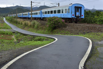 Train by empty road