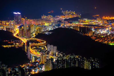 Illuminated cityscape at night