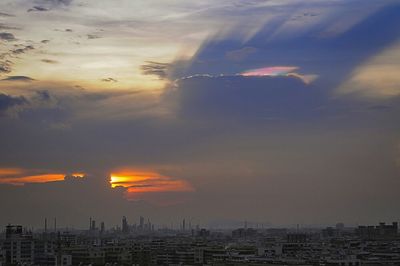 Scenic view of dramatic sky at sunset