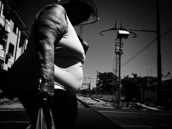 Woman walking on road