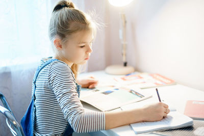 Girl studying at home