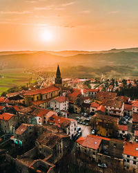 High angle view of townscape against sky at sunset