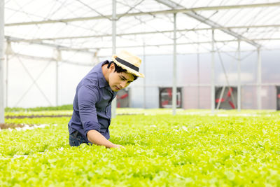 Woman standing in field