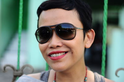 Close-up of smiling woman outdoors