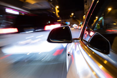 Cars on street at night