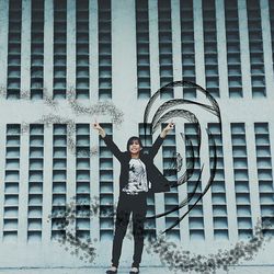 Woman standing in front of building