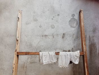 Clothes drying against wall