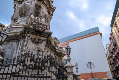 Low angle view of statue against sky