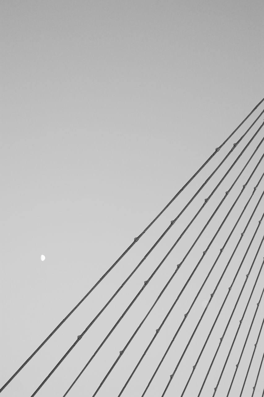 LOW ANGLE VIEW OF POWER LINES AGAINST SKY