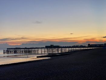 Scenic view of beach against sky during sunset.st leonard sunset southern england. 