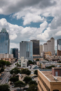 High angle view of buildings in city against sky