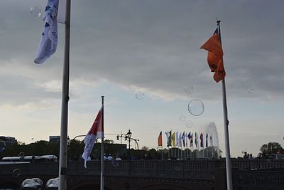 Flag on pole against sky