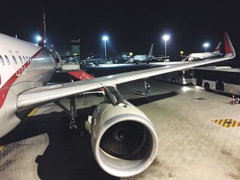 View of airplane at airport runway