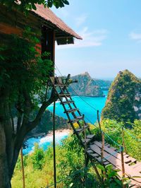Scenic view of sea and buildings against sky