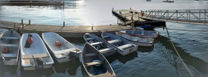 Boats moored at harbor