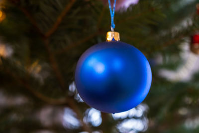 Close-up of christmas decoration hanging on tree