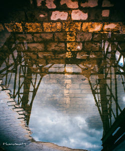 Reflection of old building on wall