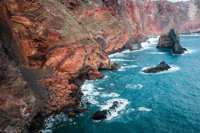 Scenic view of rocks in sea