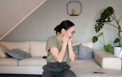 Woman rejoices at the incoming message