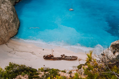 High angle view of sailboat on sea shore