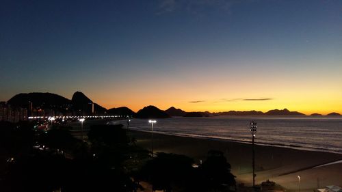 Scenic view of sea against sky at night