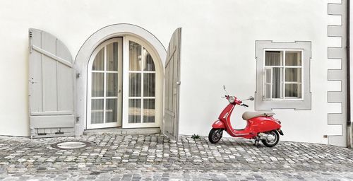 Red umbrella on street