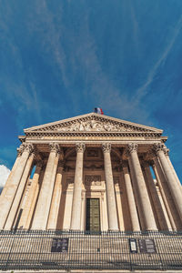 Low angle view of building against blue sky