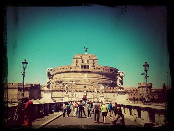 Tourists in front of historic building