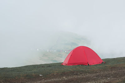 Tent on mountain against sky