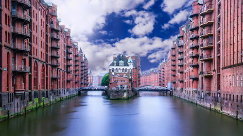 View of bridge over river in city