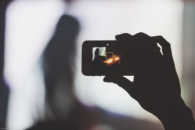 Close-up of hand holding smart phone