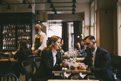 Friends sitting in restaurant