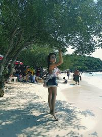 Full length of woman on beach