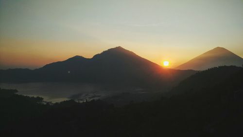 Scenic view of mountains at sunset