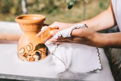 Female hands wash linen with soap