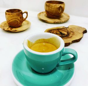 Close-up of coffee cup on table