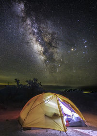 Tent against sky at night