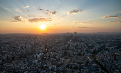 Aerial view of city during sunset