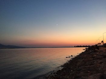 Scenic view of sea at sunset