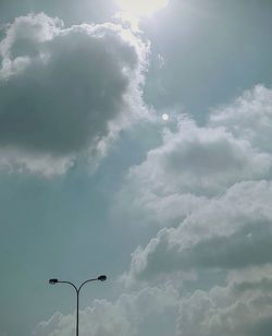 Low angle view of street light against sky