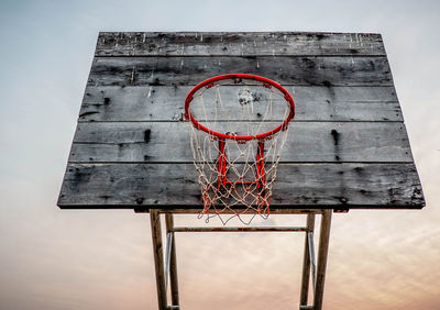 Low angle view of basketball hoop against sky