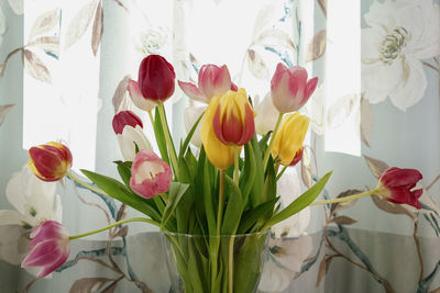 Close-up of yellow tulips in vase
