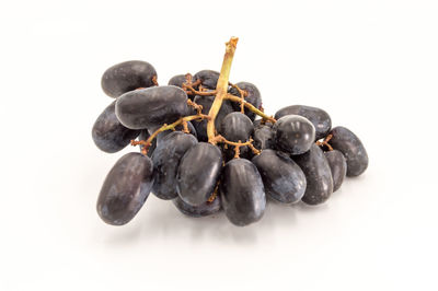 Close-up of blueberries against white background