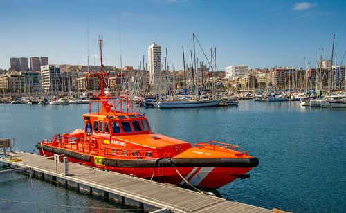 February 05 2022-picture of las palmas canary island port with rescue speed ship hard orange color