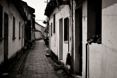 Rear view of man walking on street