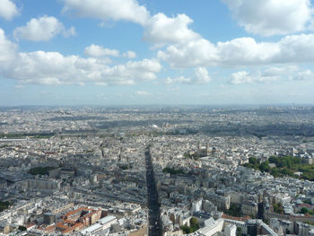 High angle view of city against cloudy sky