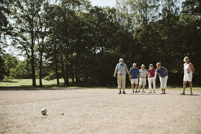 People playing pétanque